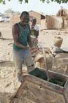 Shelling peanuts